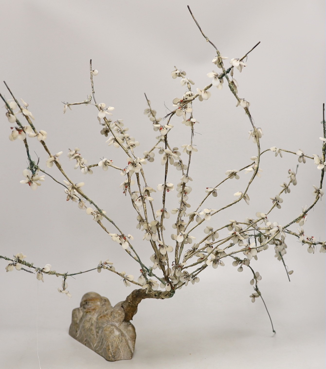 Two Chinese hardstone trees and a pair of similar sconces
